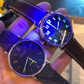 Nomos Ahoi Atlantic and Moser Pilot Tourbillon lume shot