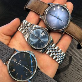 Shades of blue: Nomos Ahoi Atlantic, Rolex Datejust 16234, Moser Perpetual Calendar with different dials: matte, sunburst and fumé dial