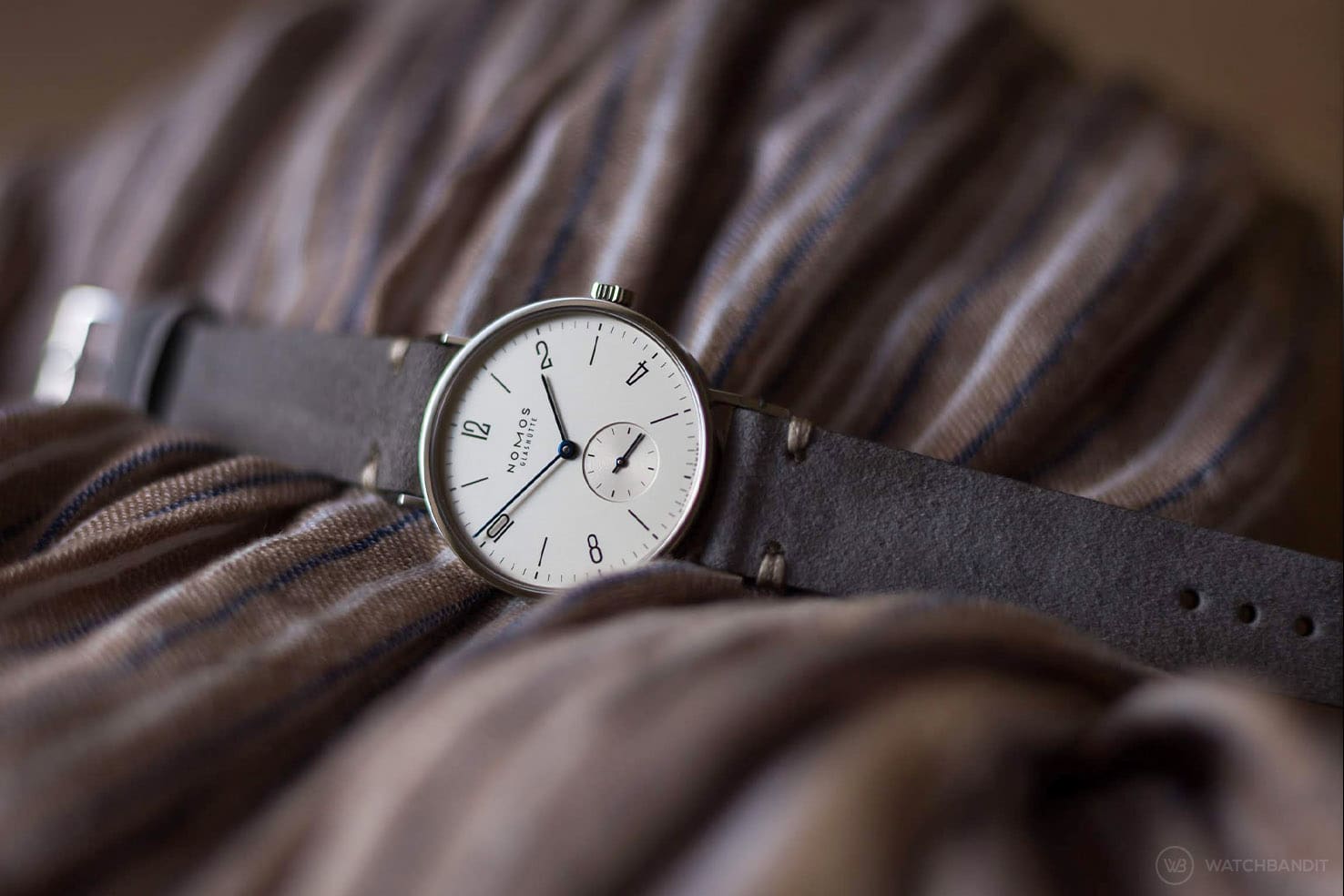 NOMOS_Tangente_dark-grey_suede_strap_watchbandit-min